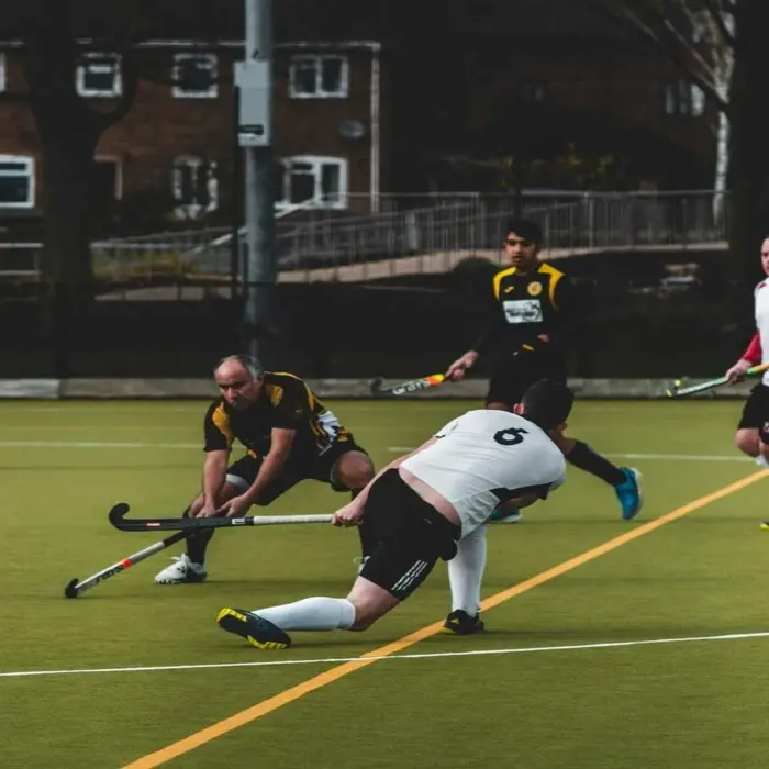 Men wear custom made field hockey uniform