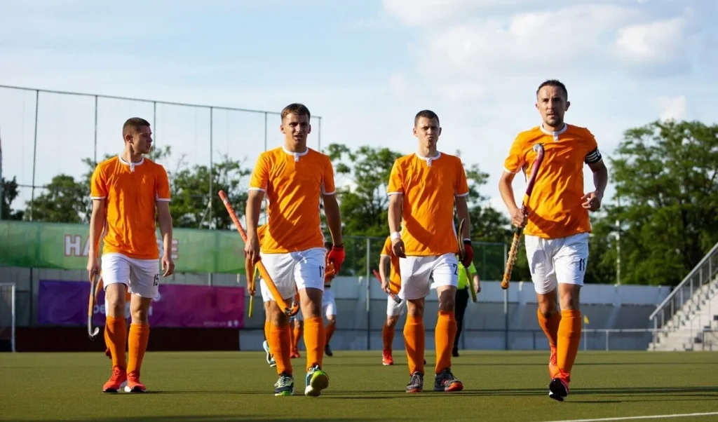 Players wear custom made field hockey uniform